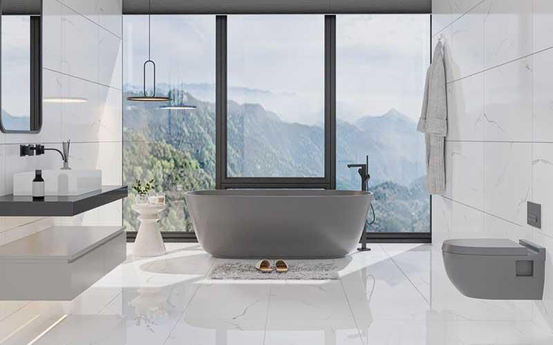 Ein Badezimmer mit Badewanne, Waschbecken, Toilette und großem Fenster.