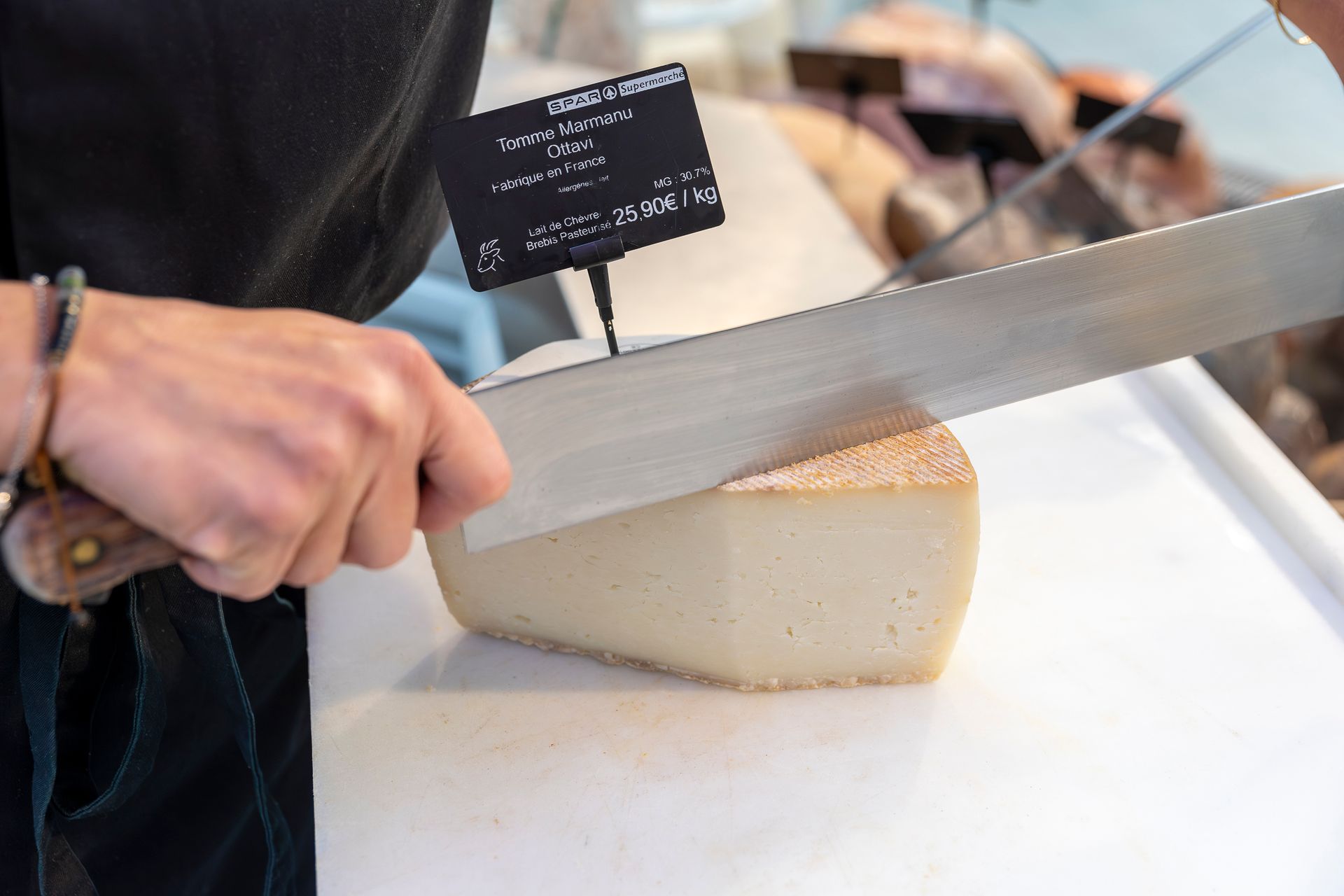 Coupage fromage à la coupe