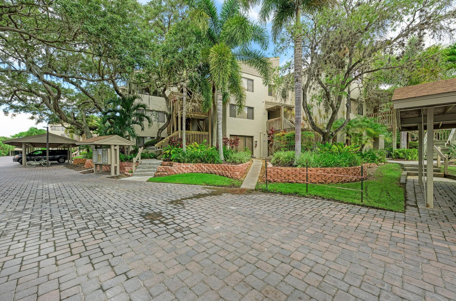 Near front walkway to Firethorn 712 condo