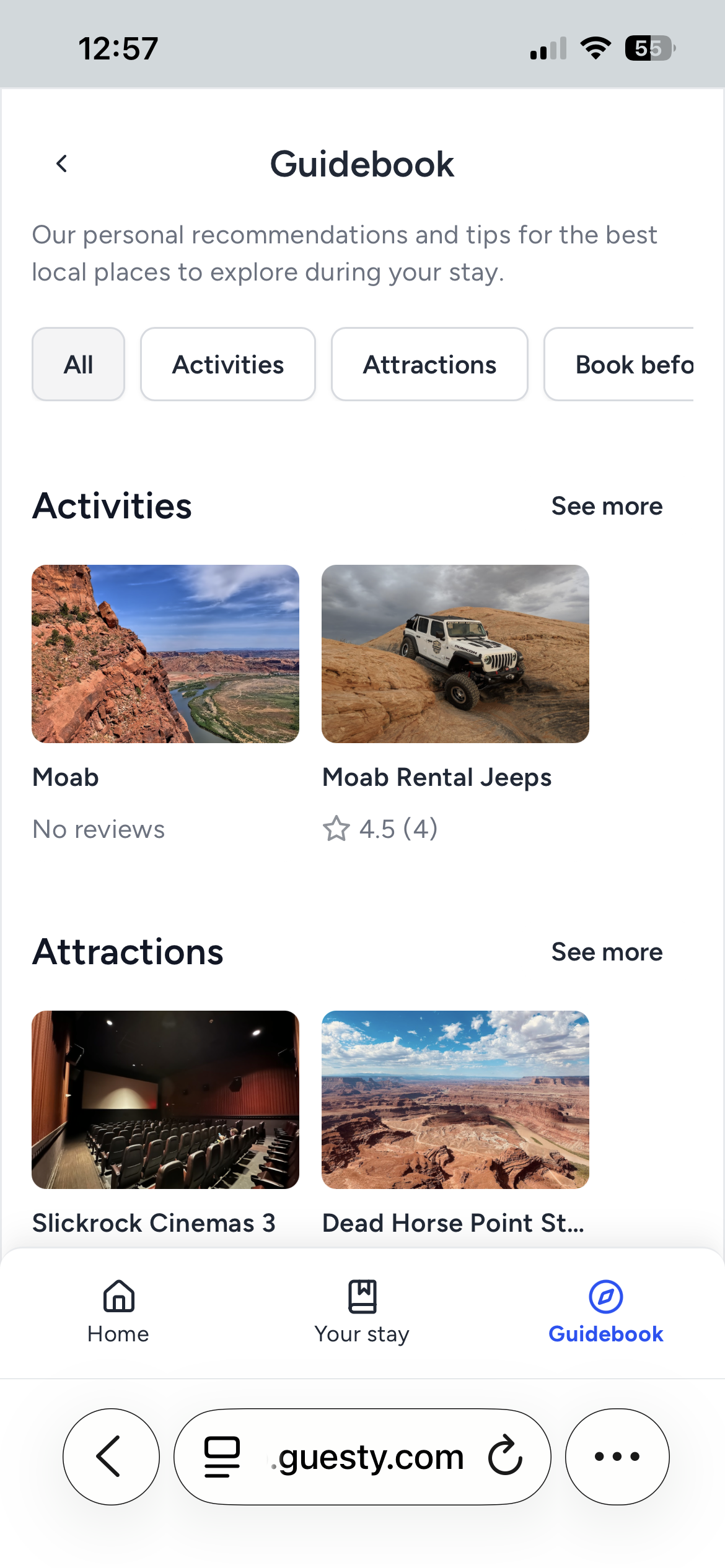 A phone screen shows a picture of a house.