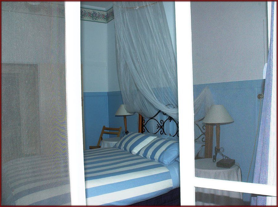 Moustiquaire battante