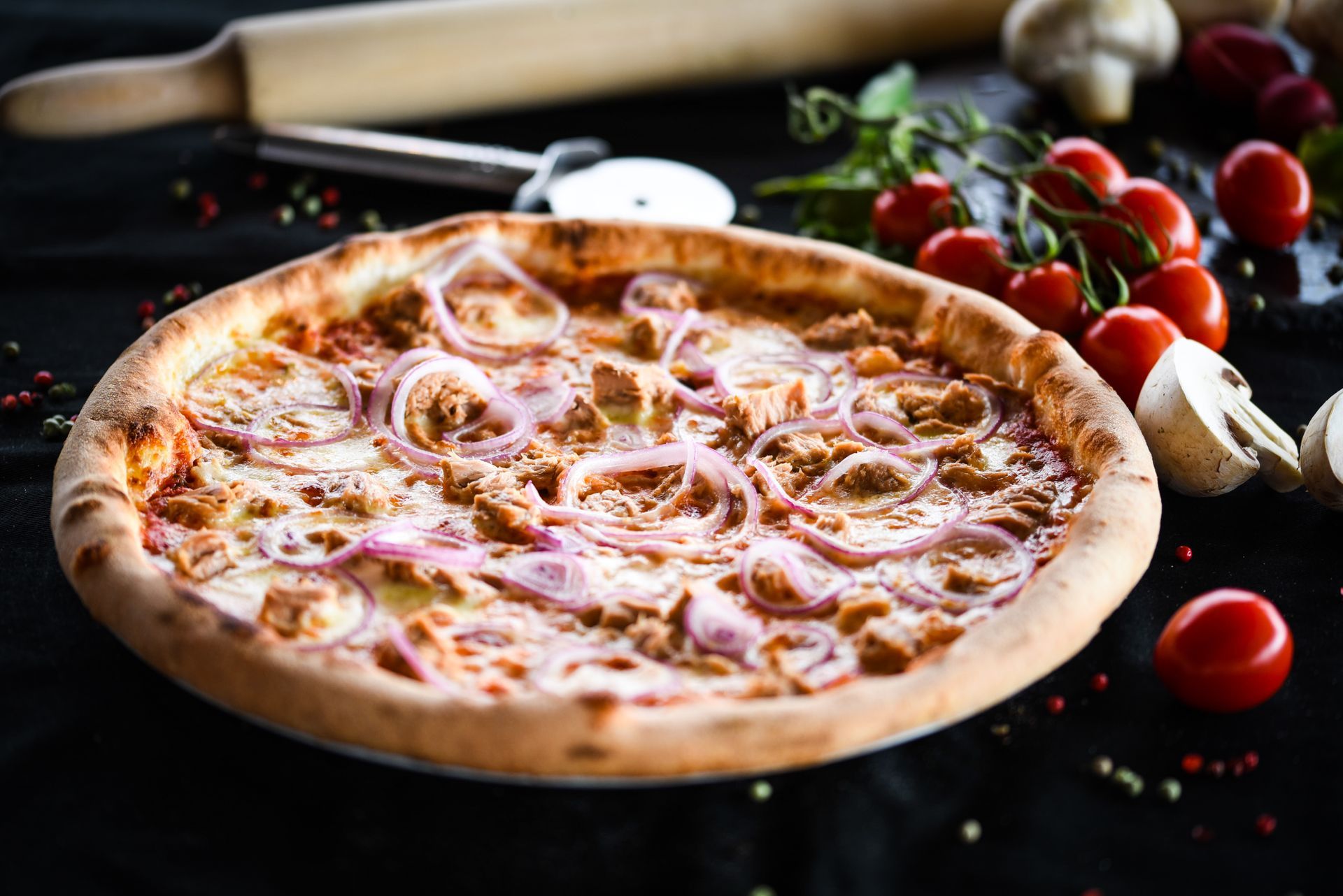 Pizzeria Don Giuseppe - Frisch gebackene Thunfischpizza