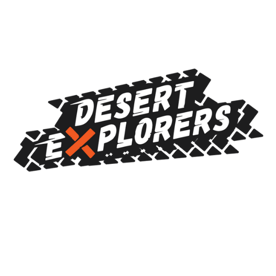 Desert Explorers logo: Black and white text on a tire tread graphic, orange X.