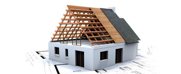 Un modelo de una casa en construcción con techo de madera.