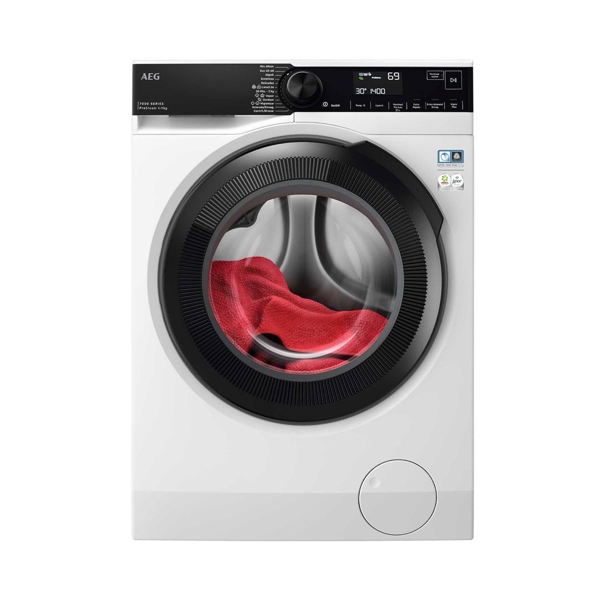 Una lavadora con una toalla roja dentro.