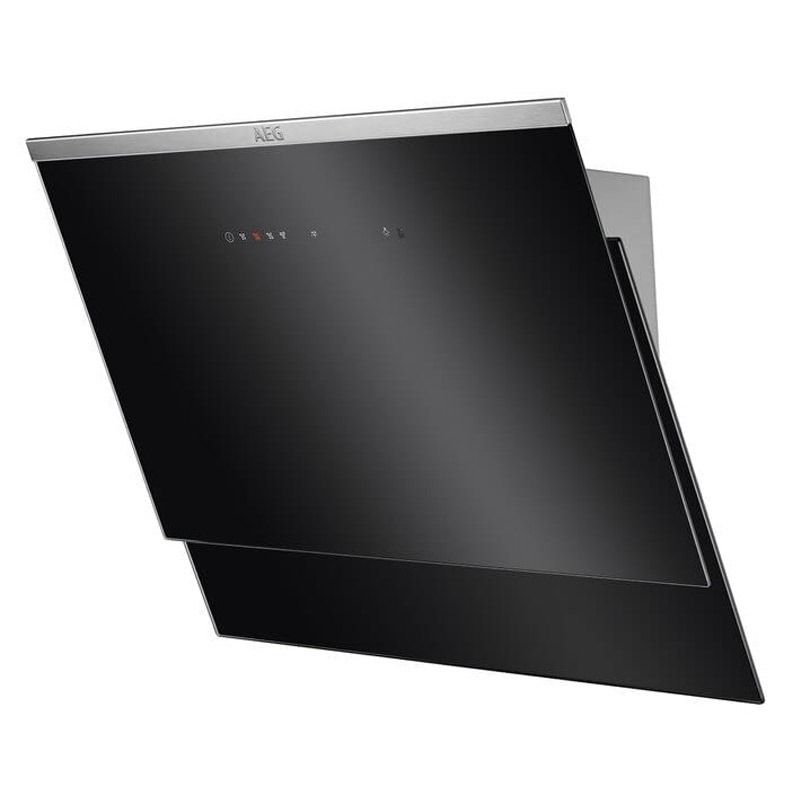 Una campana negra con marco de acero inoxidable está colgada en una pared.