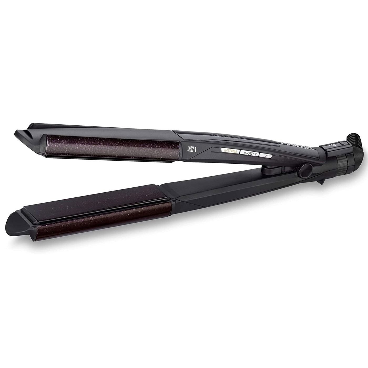 Una plancha de pelo negra está colocada sobre una superficie blanca.