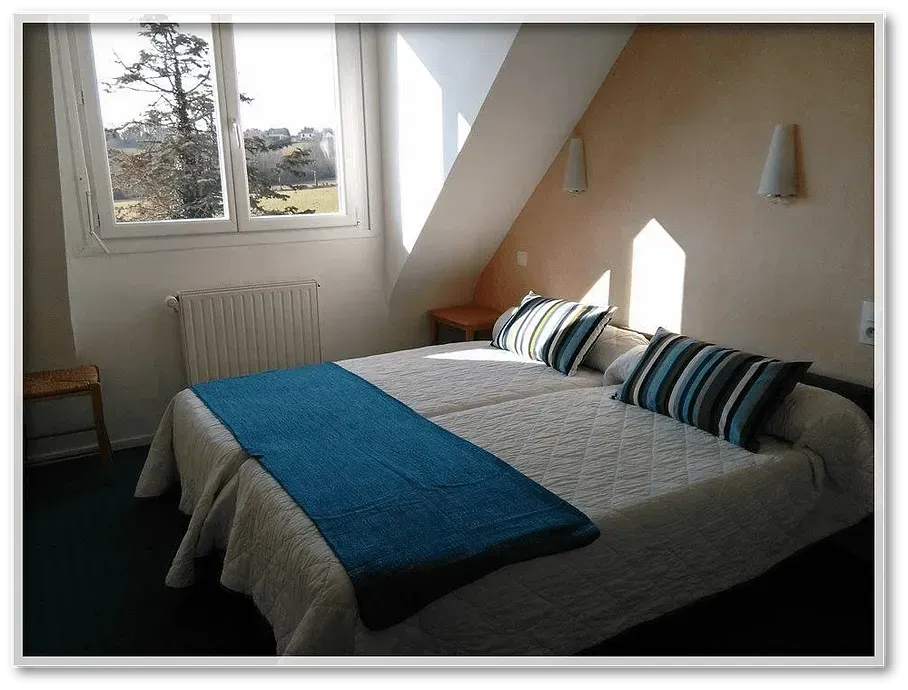 Chambre deux lits simples
