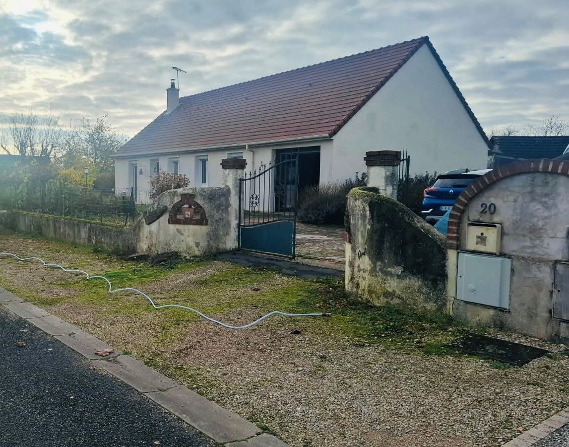 Nettoyage d'un muret avant peinture