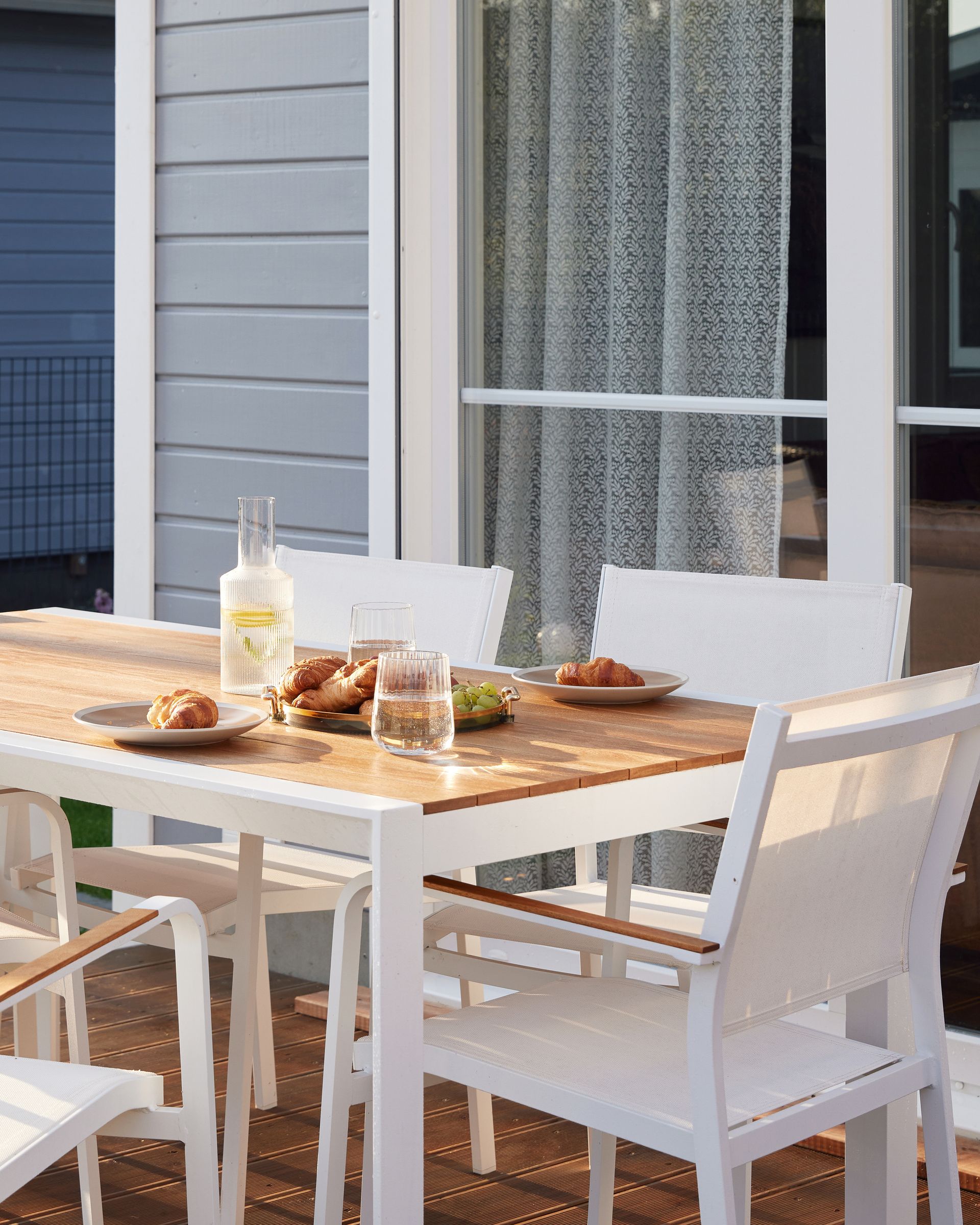 Outdoor dining table on the covered terrace