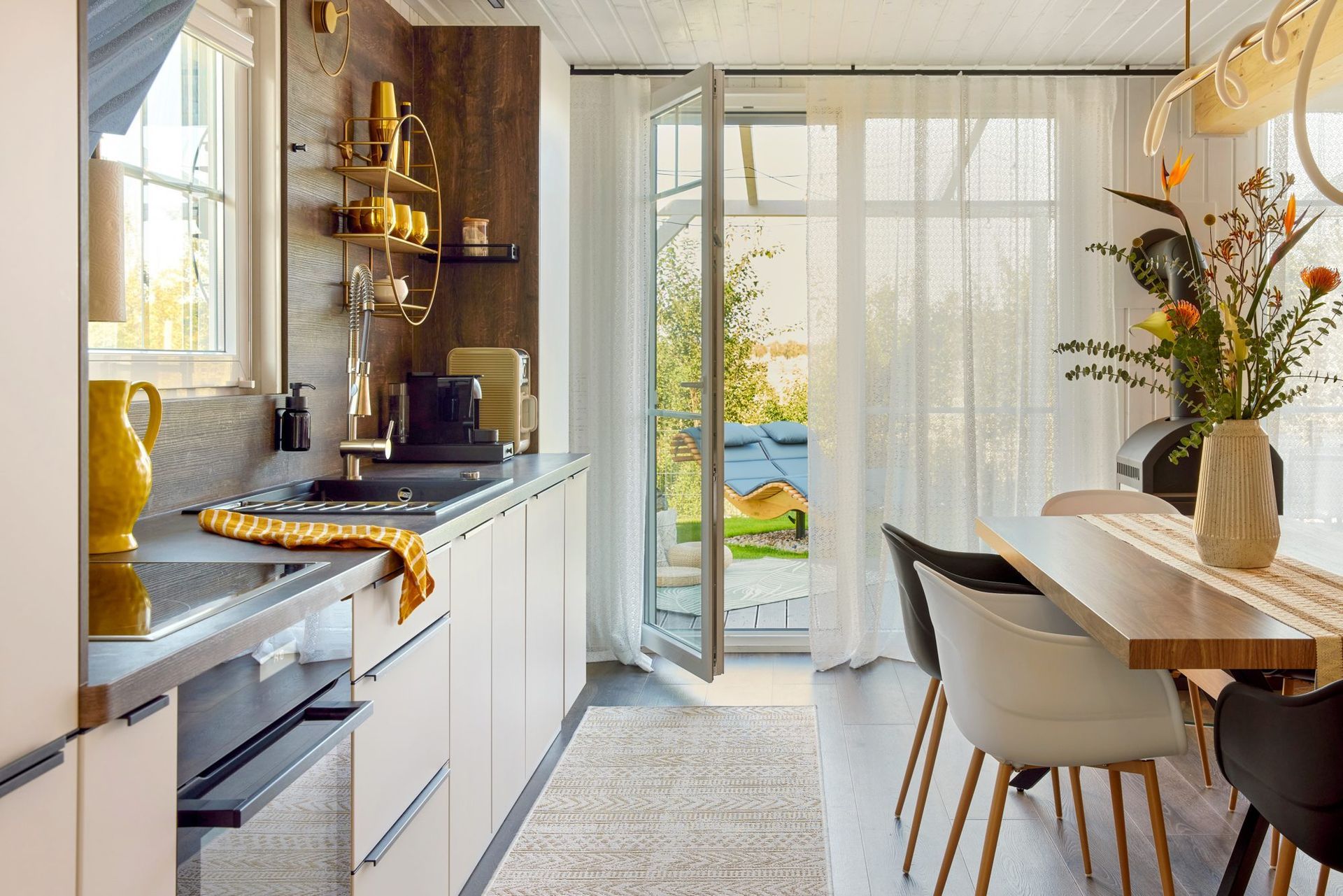 Kitchen and dining table with a door to the garden