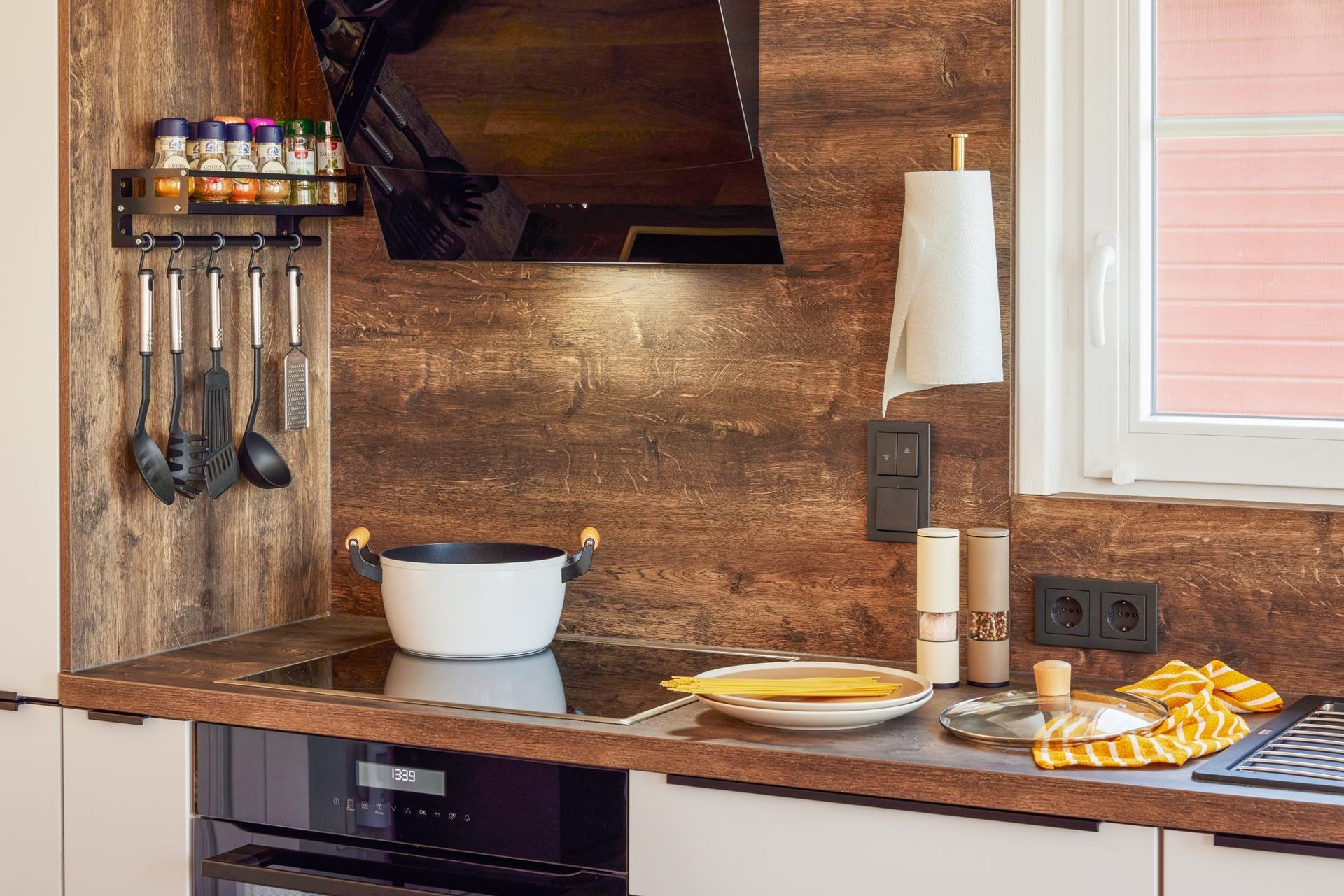 Kitchen counter with a wooden wall and breakfast