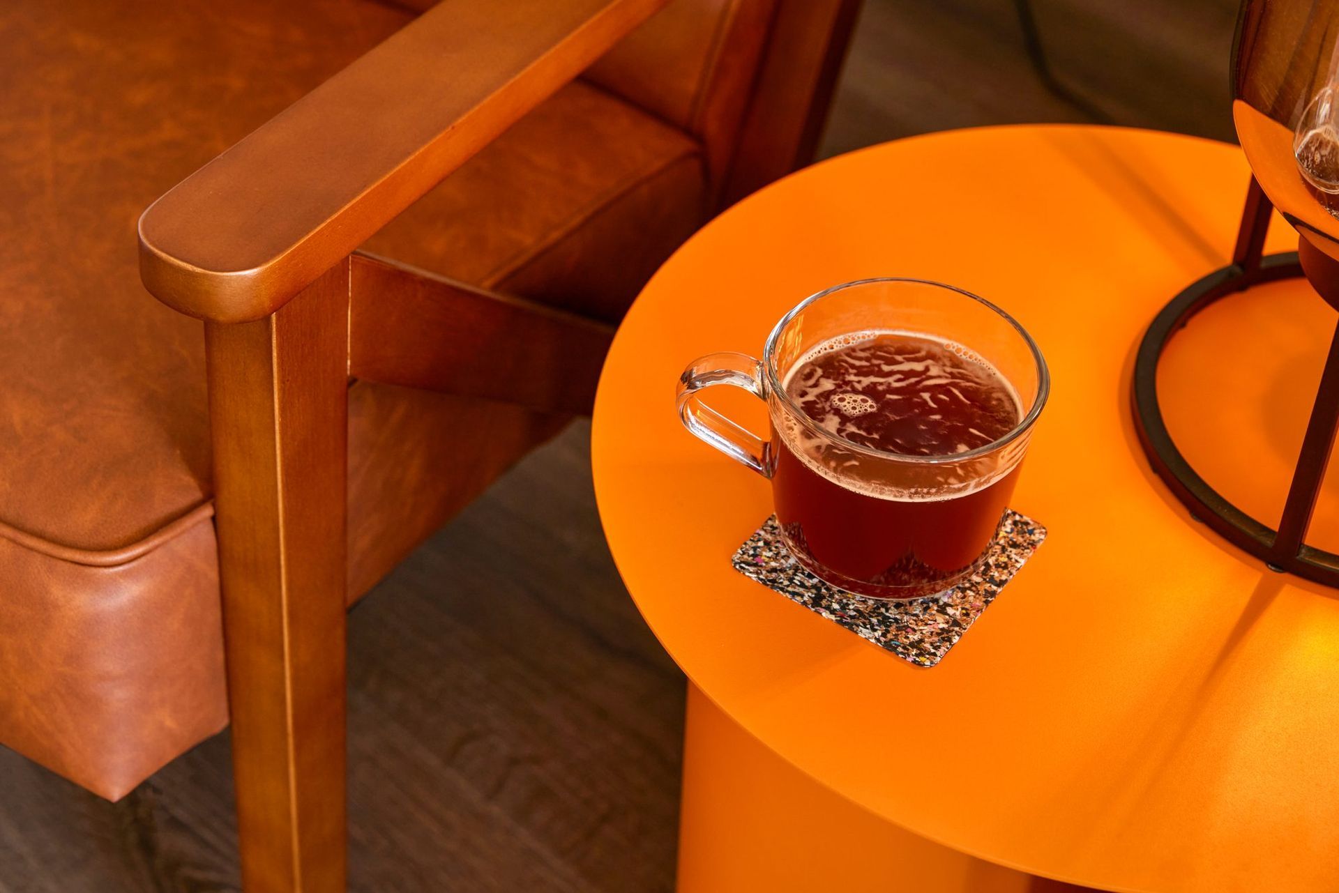 Cup of tea on an orange side table