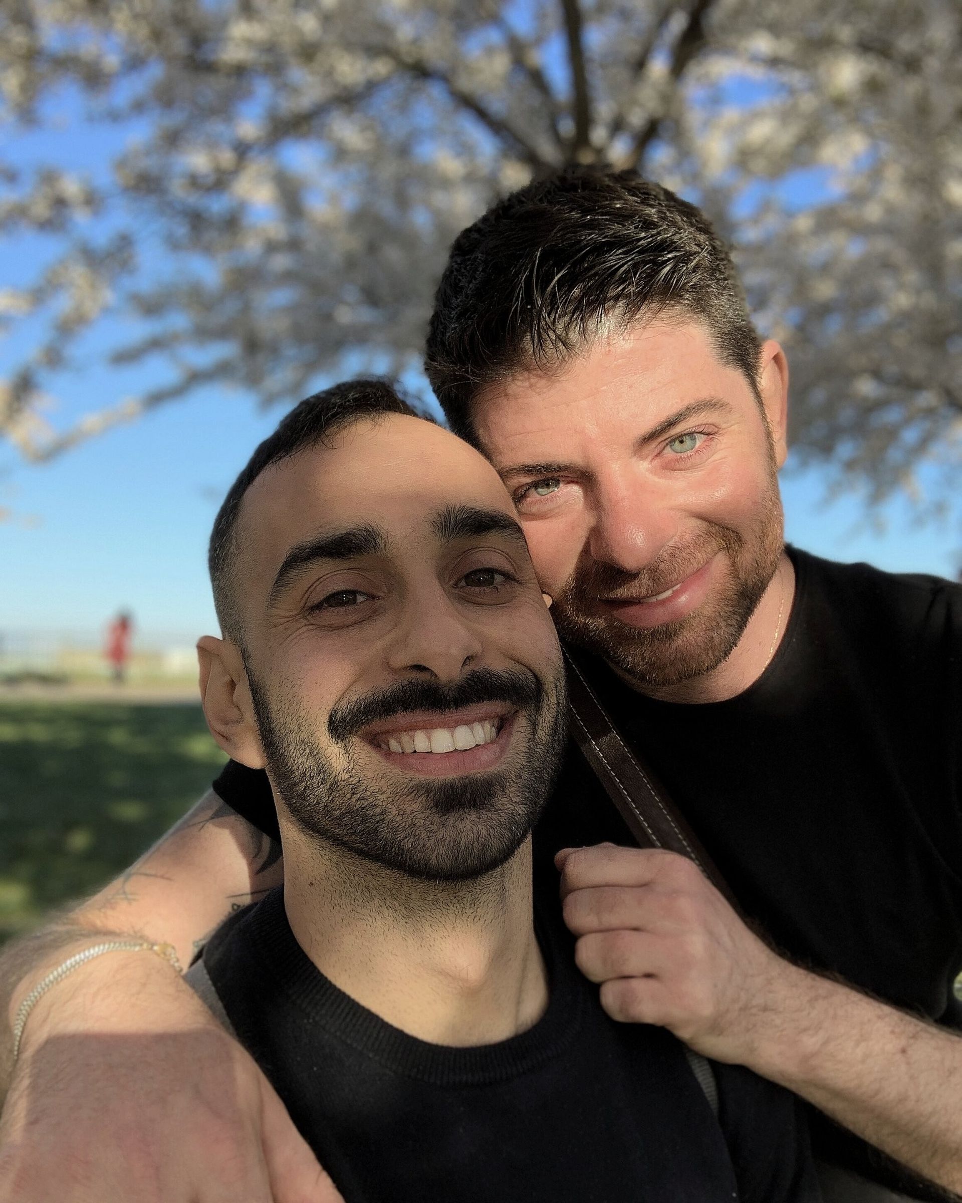 Kobi and Vincenzo under a blossoming tree