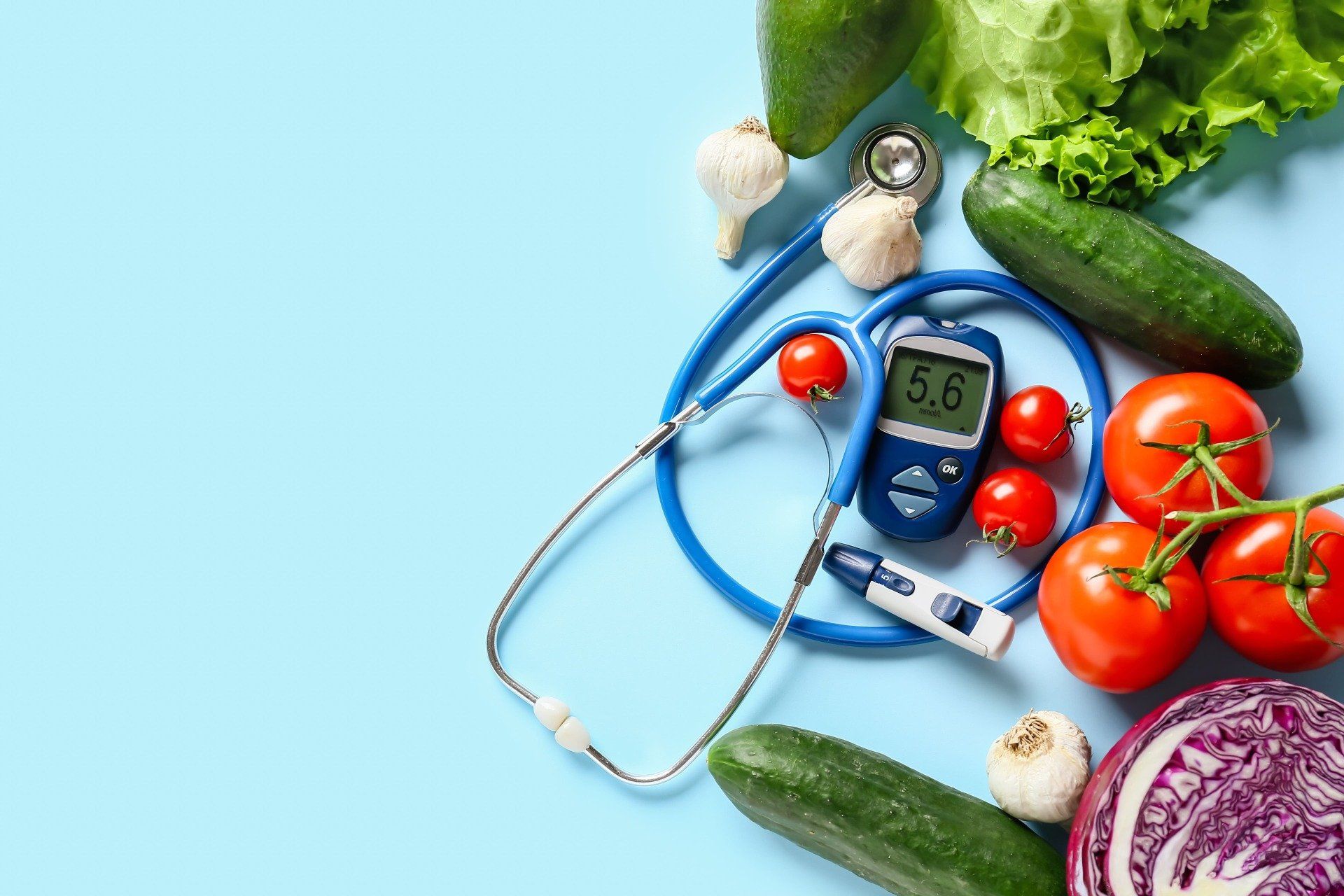 Légume, stéthoscope et appareil du diabète