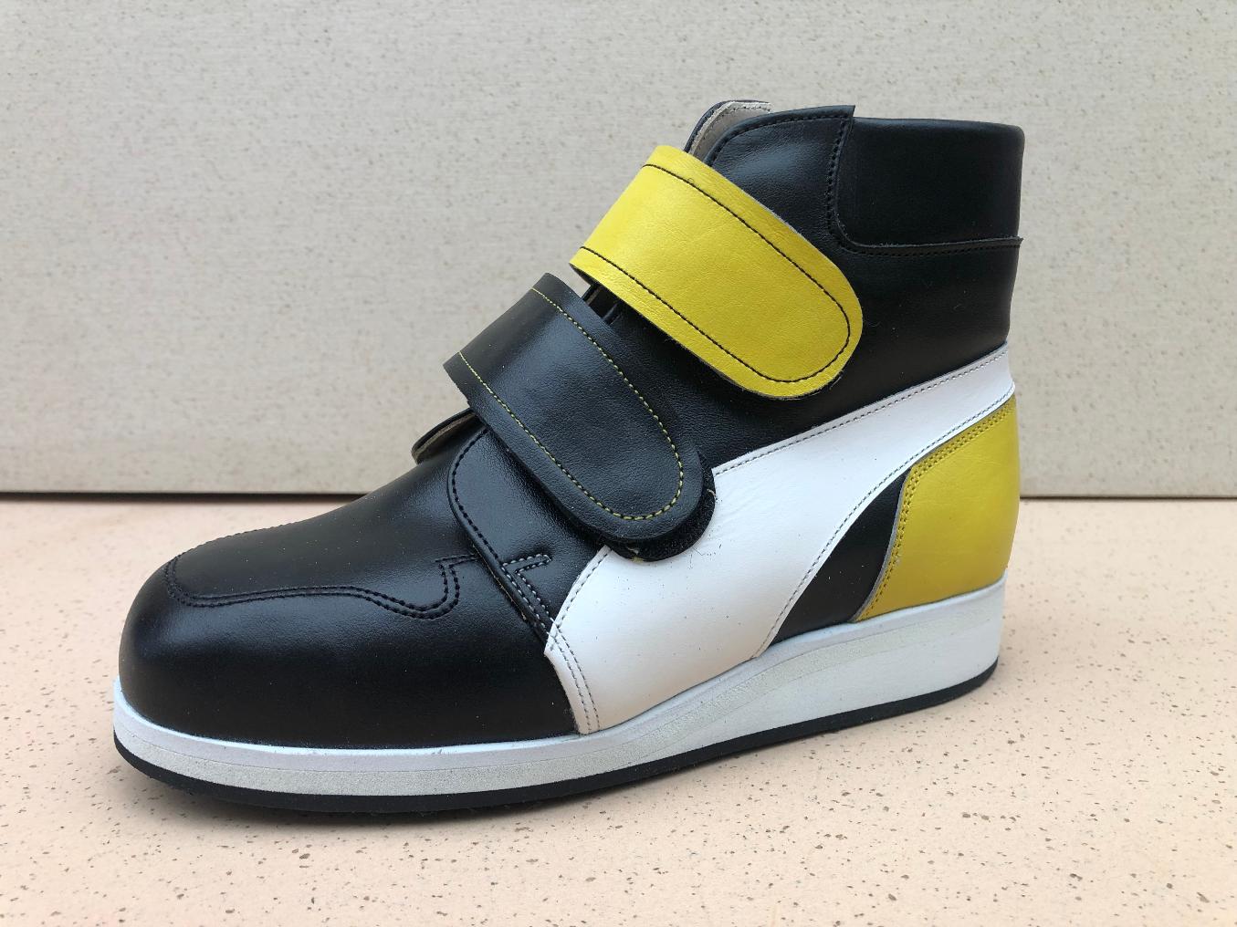 Bottine à velcro noire jaune et blanche