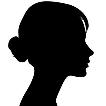 Es ist eine Silhouette einer Frau mit einem Knoten im Haar .
