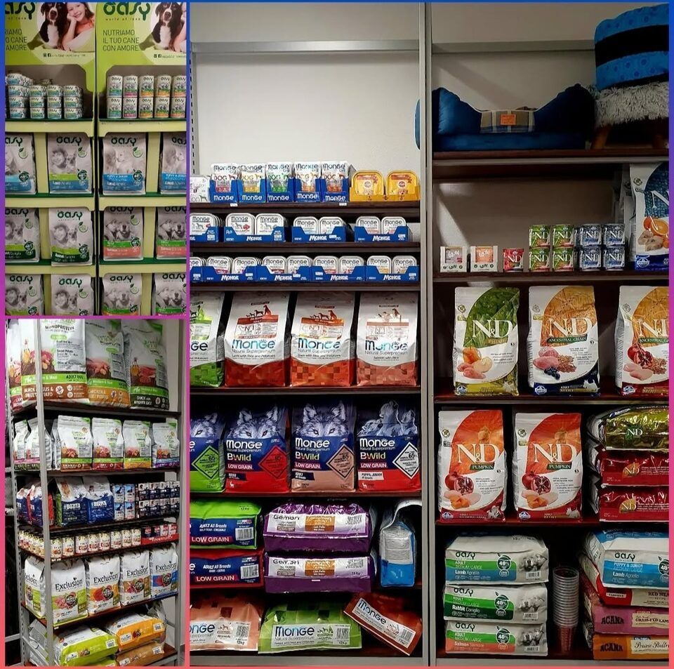 confezioni di cibo per cani in un negozio - Amico Mio di Braga