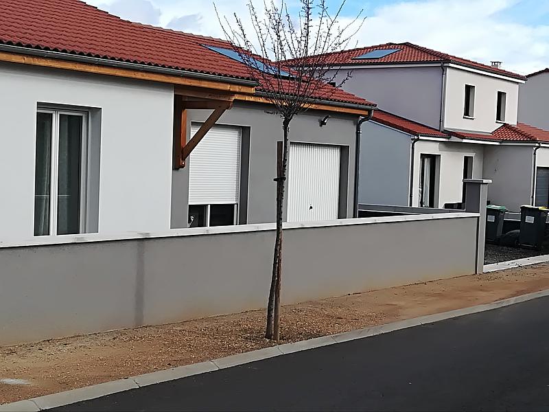 Création d'un muret de clôture et de poteaux de portail