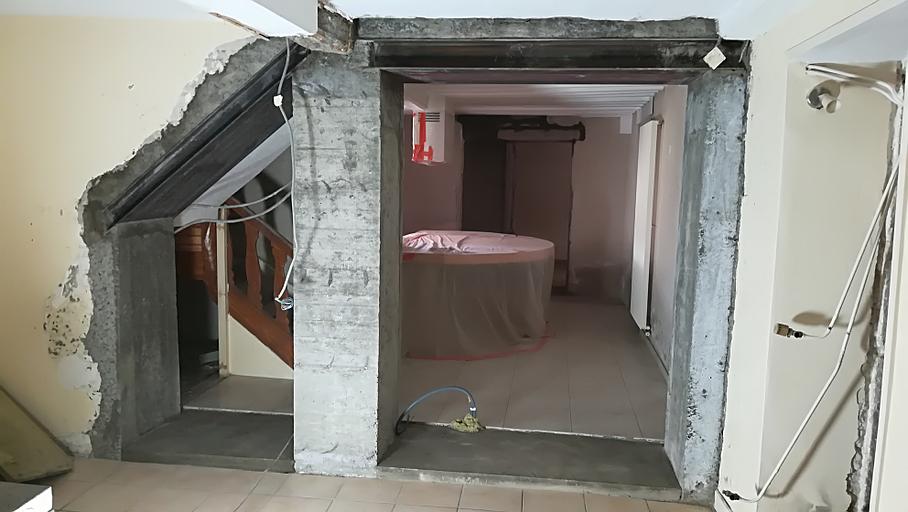 Création d'une double ouverture mixte béton et acier dans un mur porteur intérieur en pierre de largeur 60 cm Création d'une double ouverture mixte béton et acier dans un mur porteur intérieur en pierre de largeur 60 cm