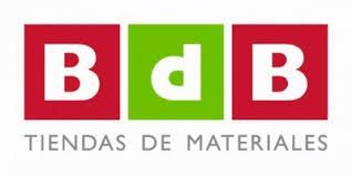 A red and green logo for tiendas de materiales