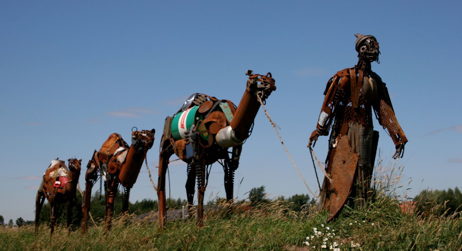 Mensch mit Kamel-Karawane