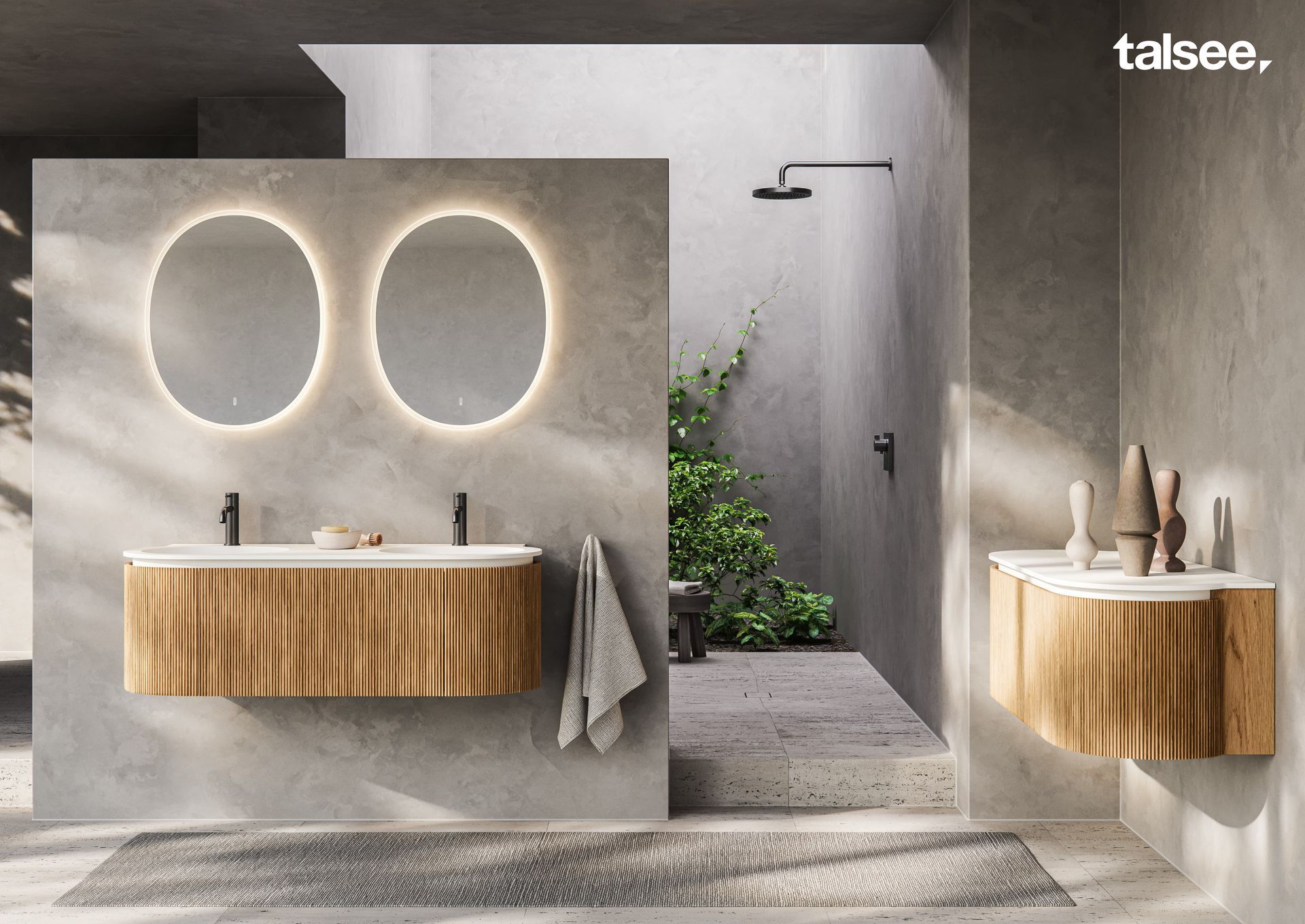 Ein Badezimmer mit zwei Waschbecken und zwei Spiegeln, auf deren Unterseite Talsee steht