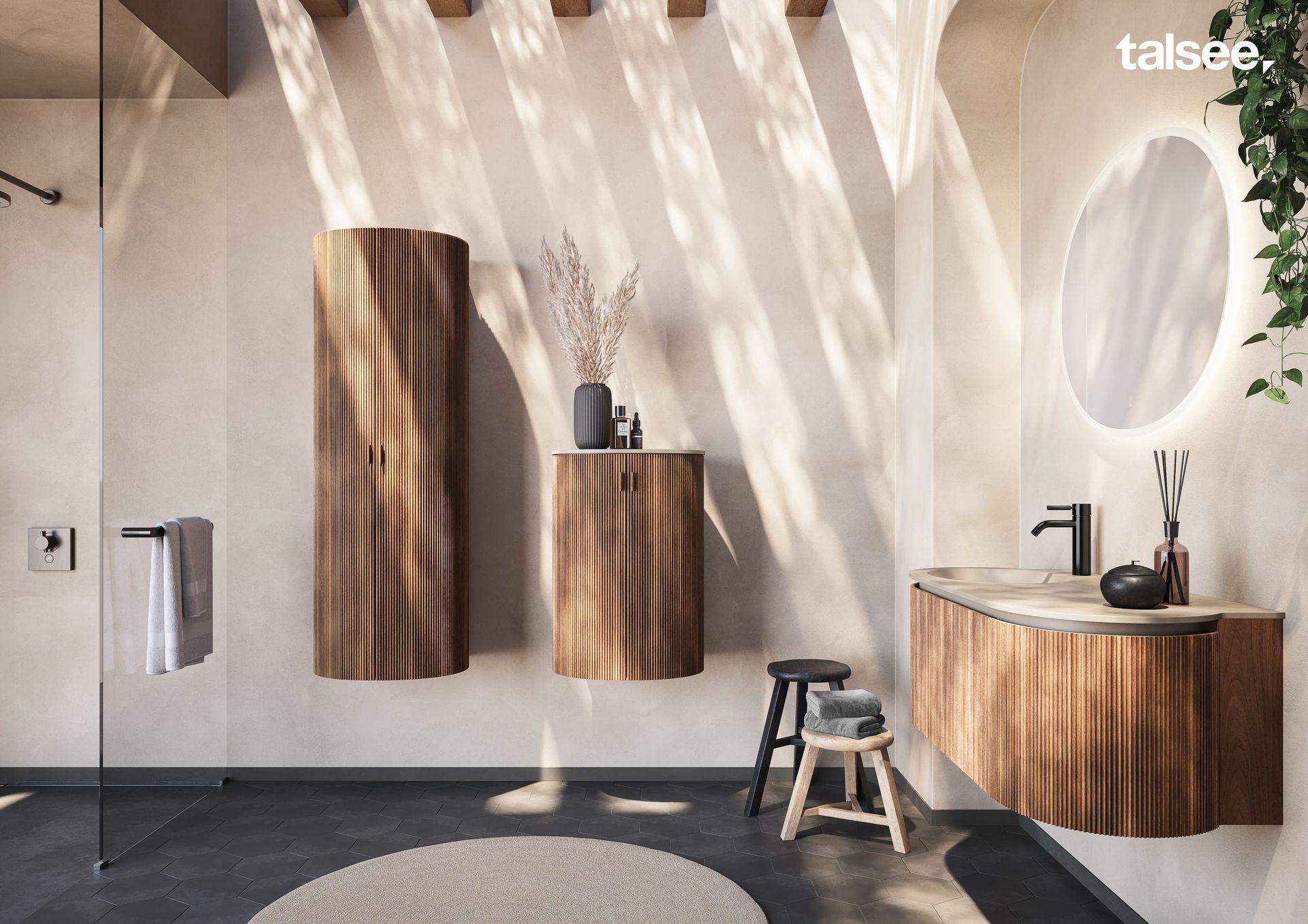 Ein Badezimmer mit Holzschränken und einem runden Spiegel