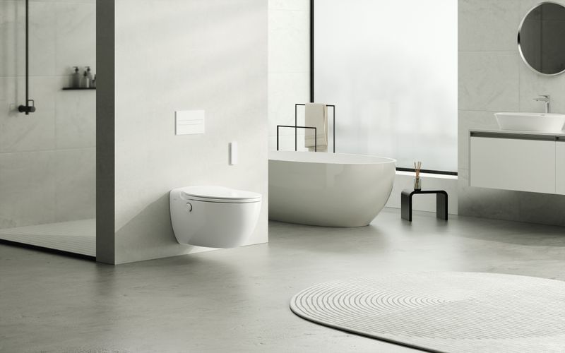 Ein Badezimmer mit Badewanne, Toilette, Waschbecken und Dusche.