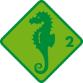 Grüner Diamant mit Seepferdchen und der Zahl 2.