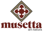 Logotipo de Musetta con emblema floral granate y las palabras &ldquo;musetta art natura&rdquo; debajo.
