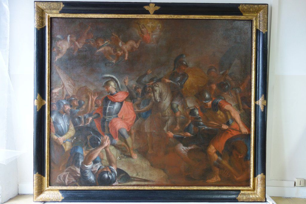 Restauration d'une peinture de bataille après