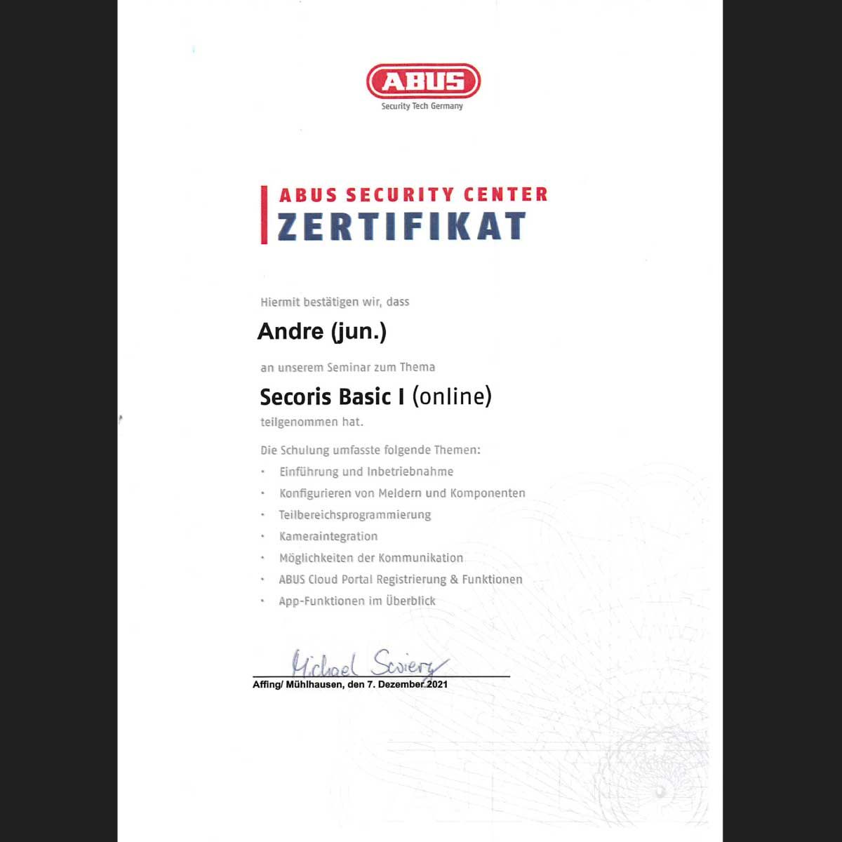 „ein Zertifikat des ABUS Security Center besagt, dass Andre Jun.“
