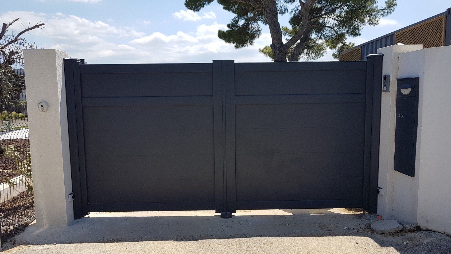 Pose de portail en acier