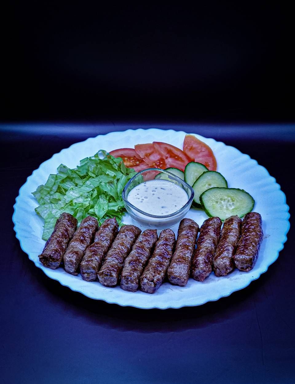 Gegrilltes Fleisch von der Restaurant Emporium GmbH