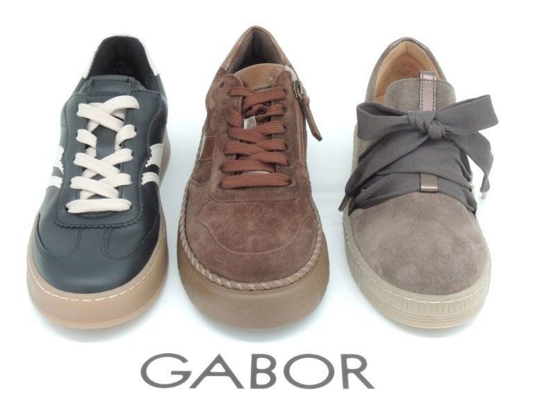 Drei lässige Gabor-Sneaker in Marineblau, Braun und Grau auf weißem Hintergrund