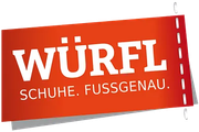 Rotes Schild des Schuhgeschäfts Würfl mit weißer Schrift: „WÜRFL SCHUHE. FUSSGENAU.“