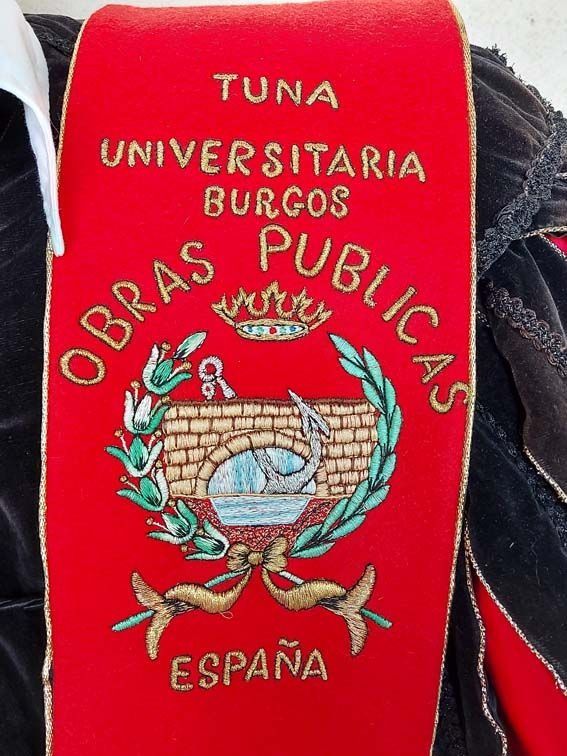 Red sash embroidered with 