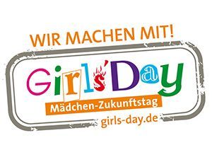 Logo für den Girls‘ Day: Enthält den Text „Girls‘ Day – Mädchen-Zukunftstag“ in bunten Buchstaben mit feurigem Akzent.