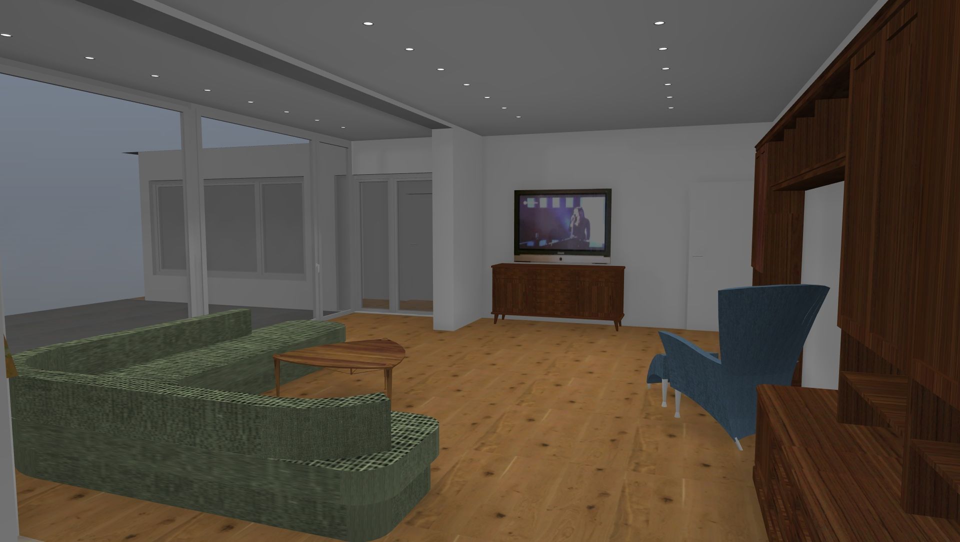 Ein Wohnzimmer mit Couch, Sessel, Tisch und Fernseher.