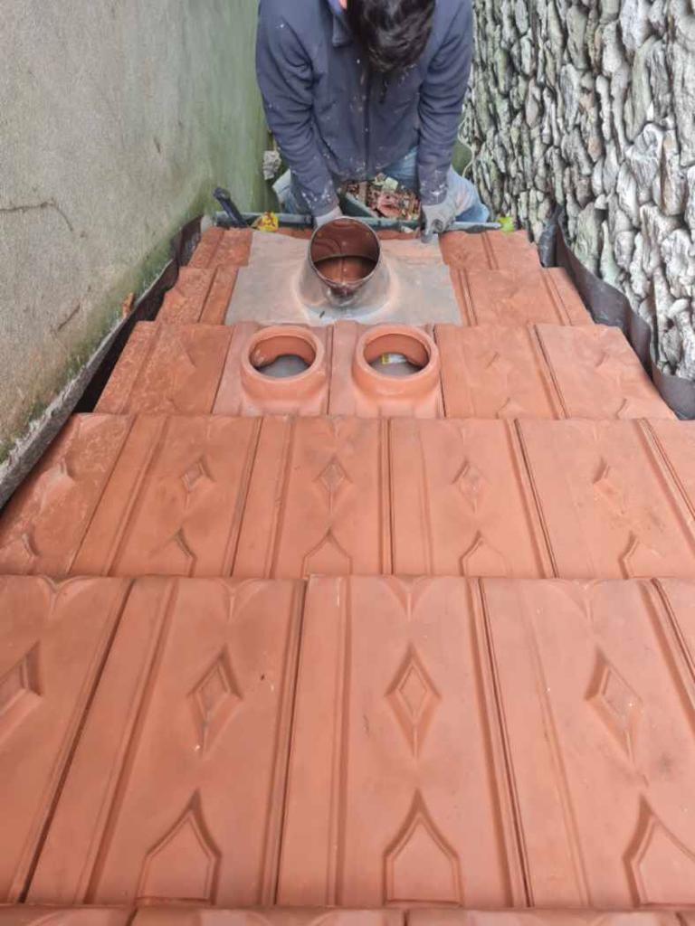 Installation de tuyaux d'évacuation d'air