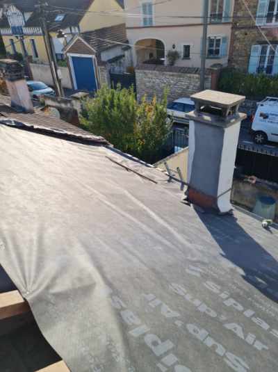 Mise en place de la protection autour de la cheminée