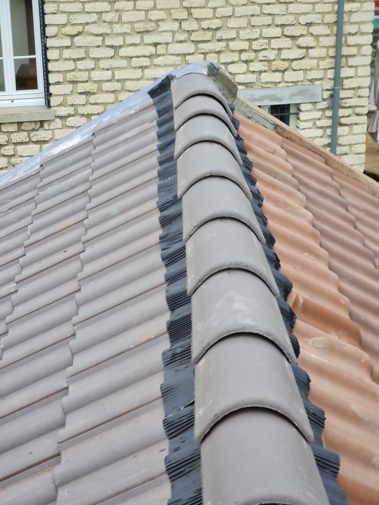 Resultat d'un changement de tuiles de faîtage