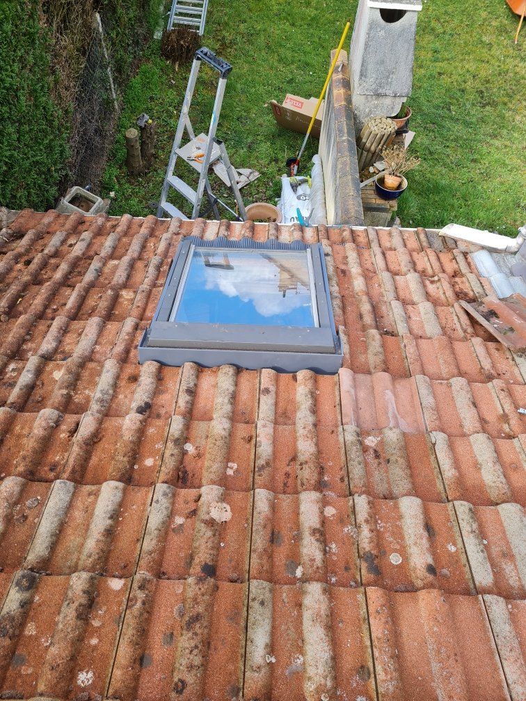 Fin de l'intervention pour refaire l'étanchéité d'un velux