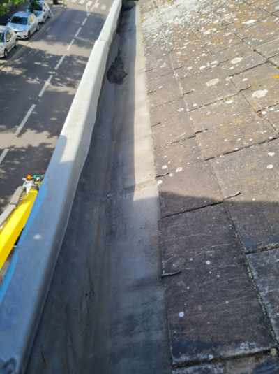 Nettoyage de goutière après