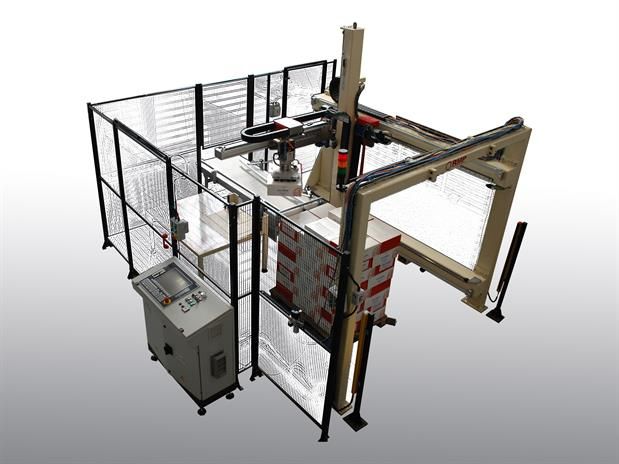 Una macchina è posizionata in una stanza circondata da una recinzione.