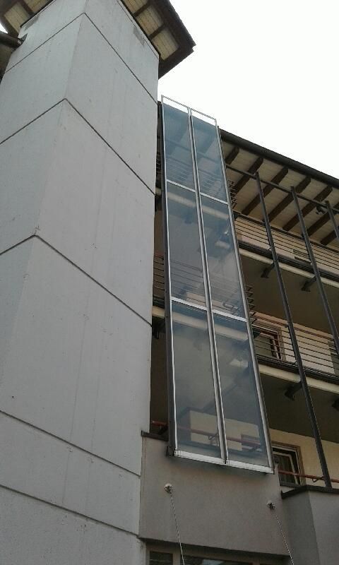 Fassadenverglasung als Regenschutz