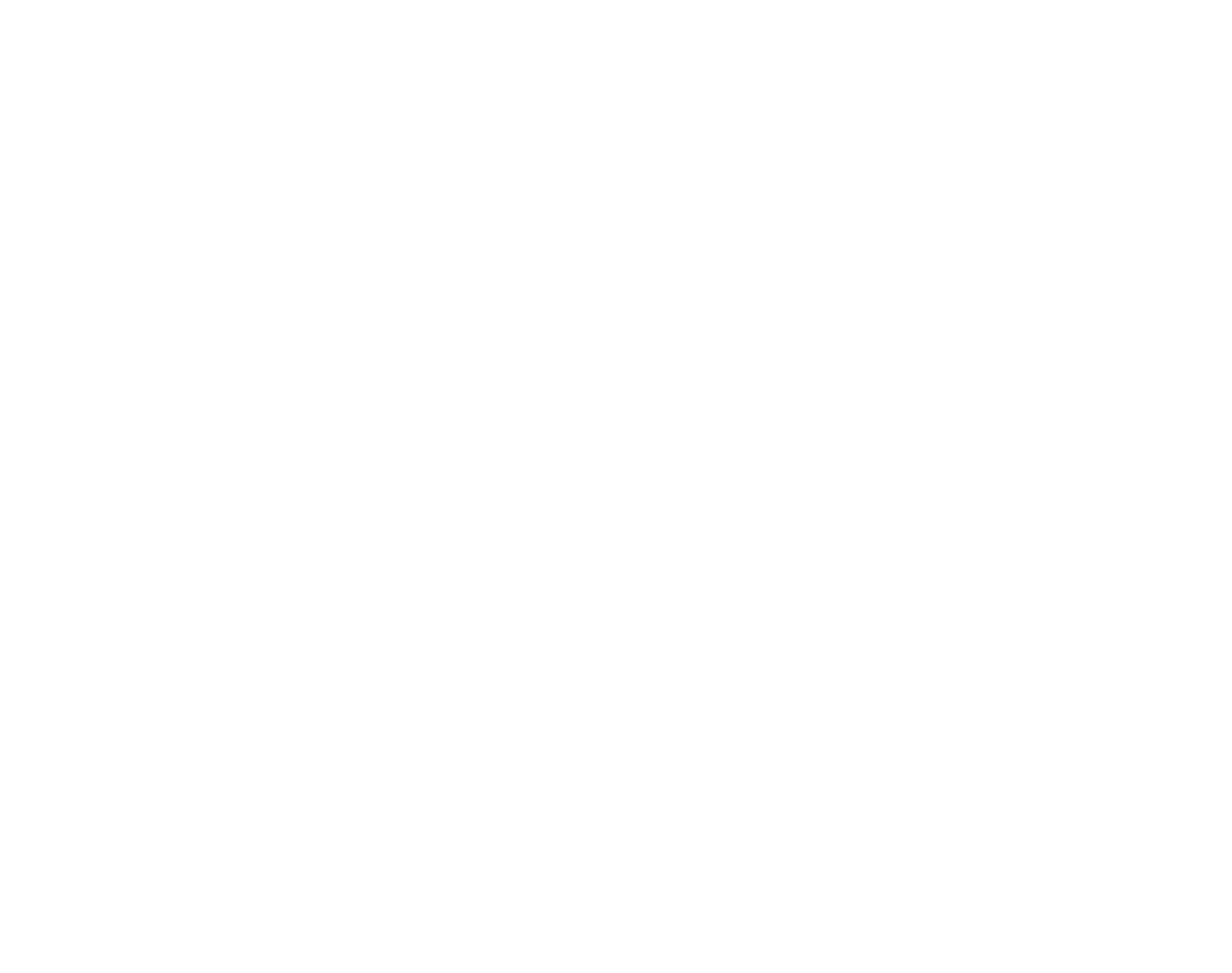 Un maçon monte un mur de parpaings.