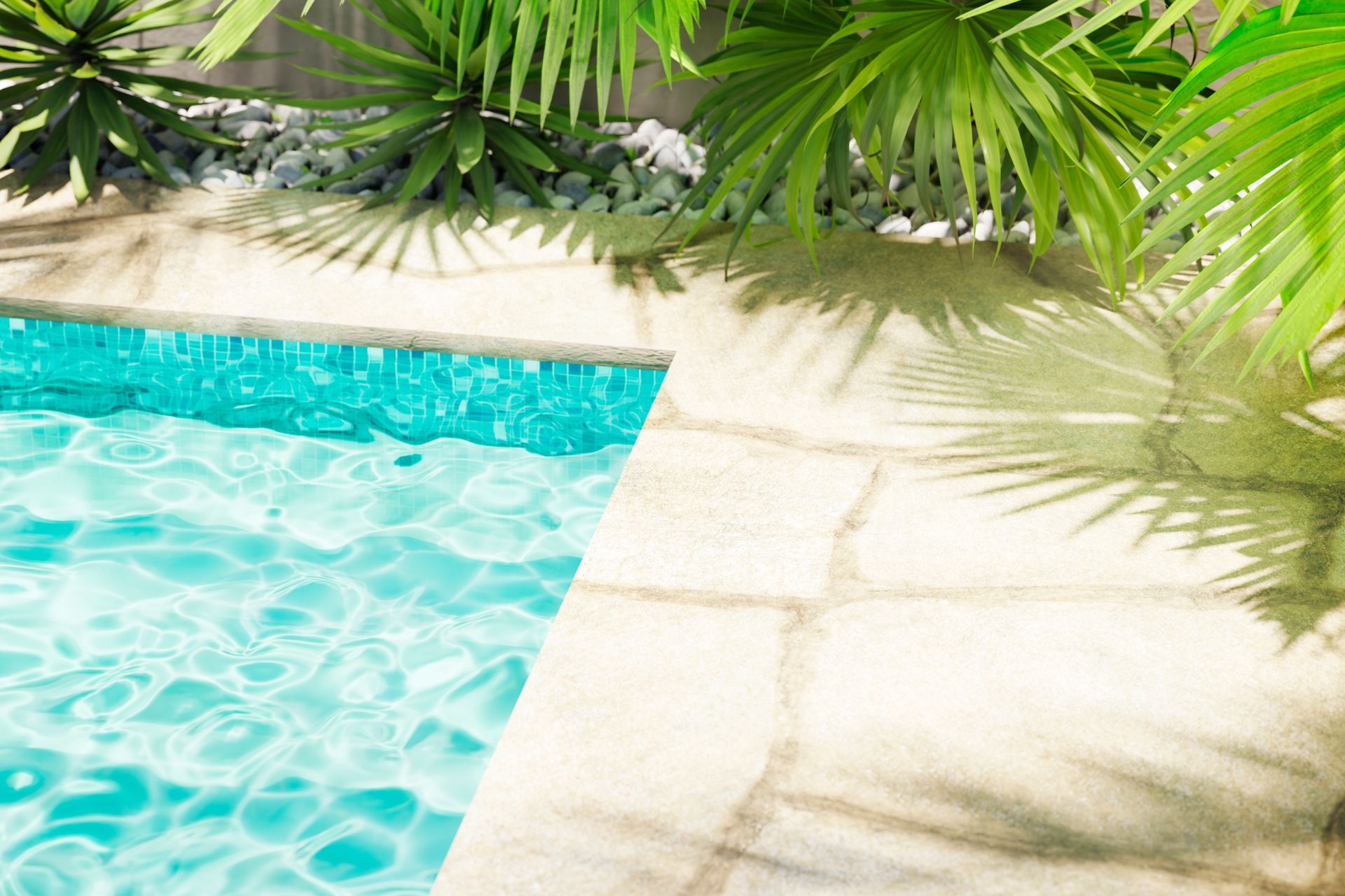 Bord de piscine en pierres blanches.