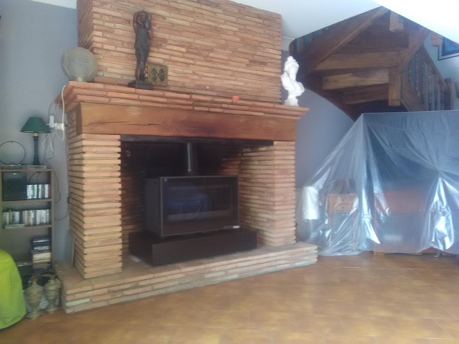 Foyer bois dans cheminée existante